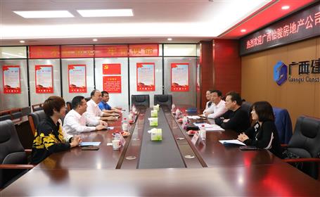 覃振华： 携手共进营生长 深化相助谱新篇